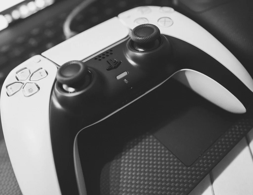 PlayStation 5 DualSense controller close-up, black and white photo
