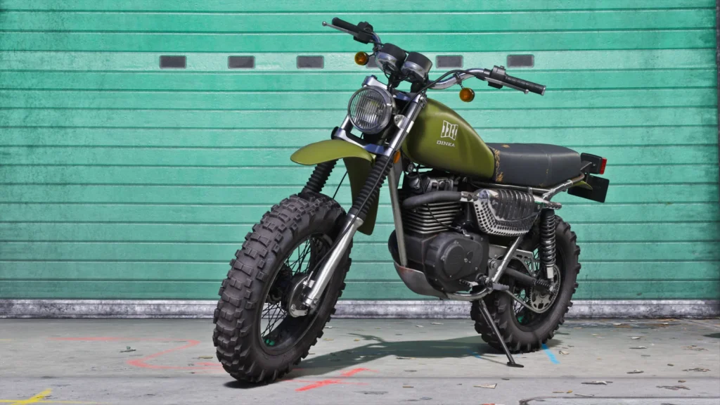 Green Dinka Enduro motorcycle outside a garage in official GTA VI Ultimate Edition media