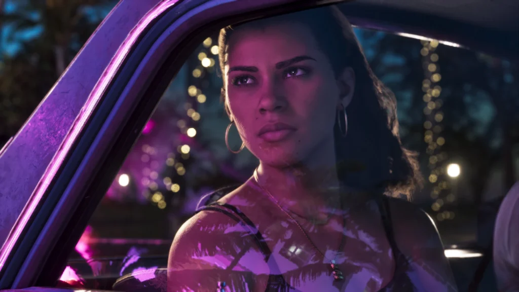 Lucia looks out from the front seat of a car under purple neon light at night.