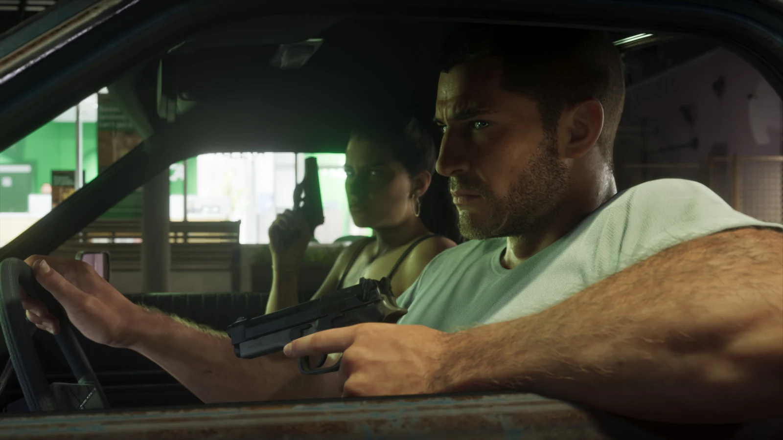Jason drives a car while Lucia holds a handgun in the passenger seat.
